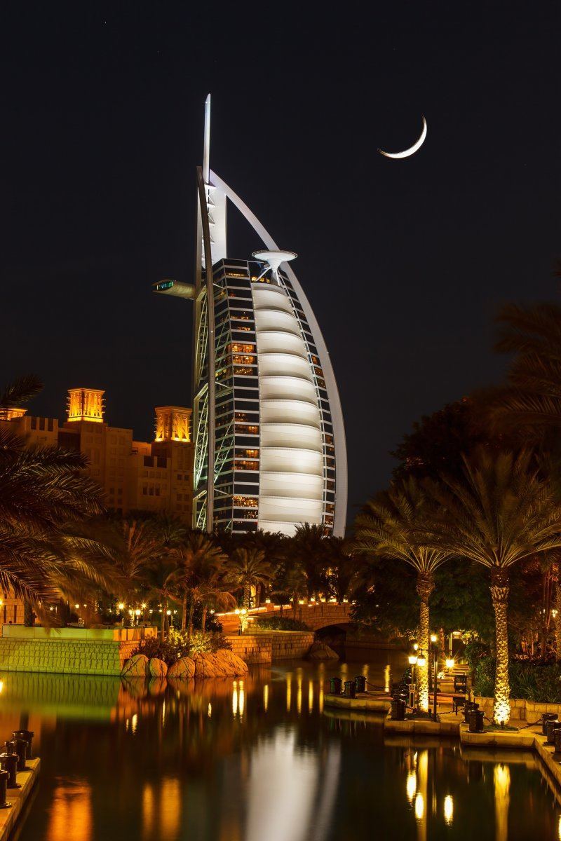 The distinctive Burj Al Arab in Dubai at night