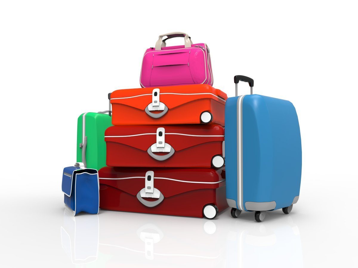 Packing tips: Colorful luggage pops out in a sea of black bags.