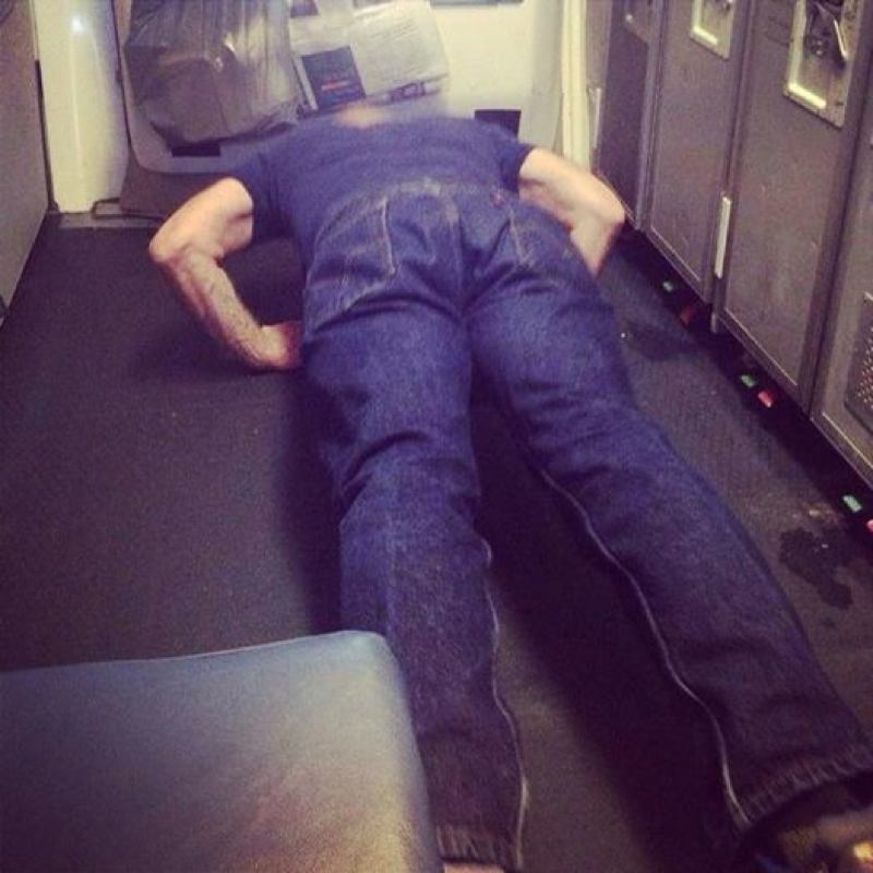 Guy Doing Push Ups in Galley