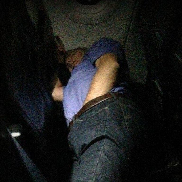 Passenger with Hands Down Pants