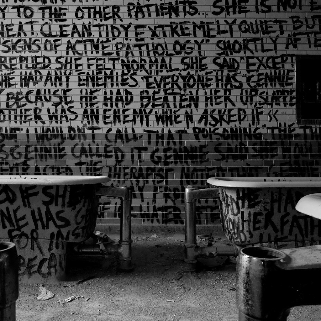 Patient Gennie Pilarski's notes painted on a bathroom wall