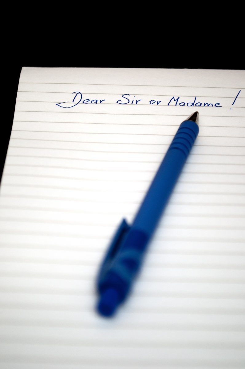Dear Sir Or Madame Written On A Notebook