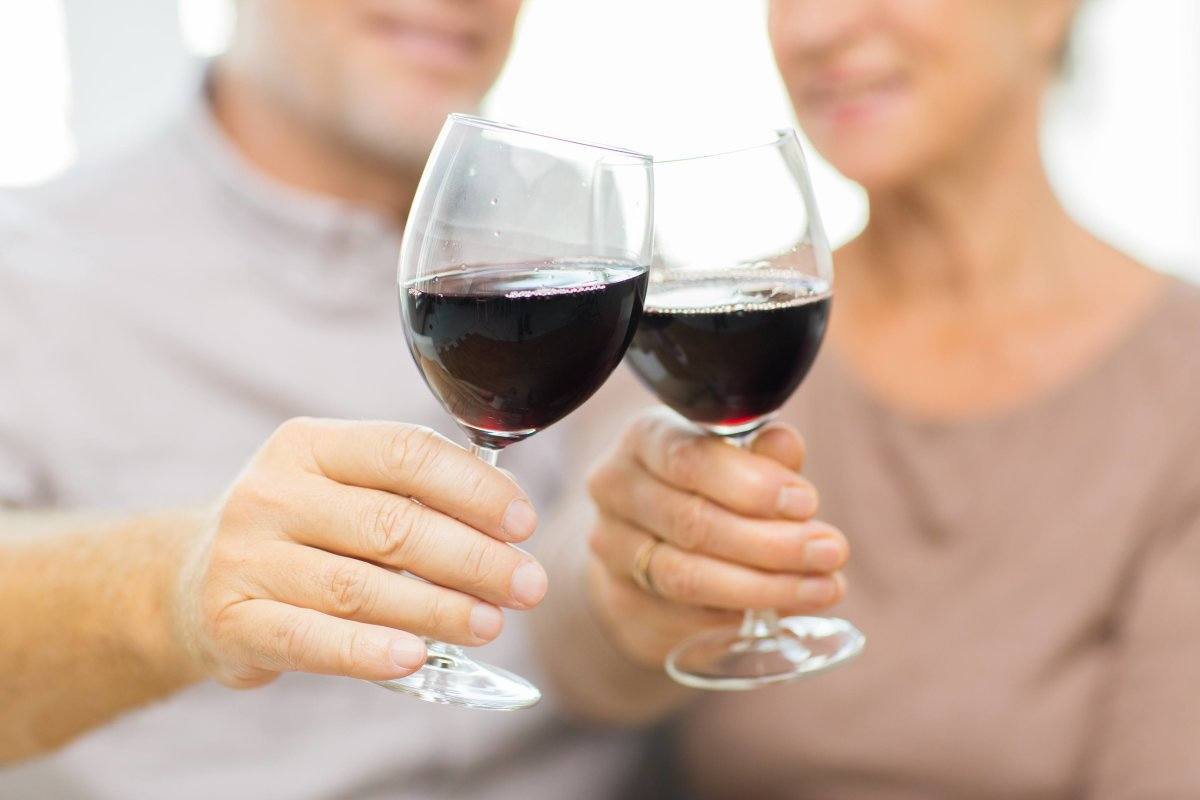 Clinking Glasses With Red Wine