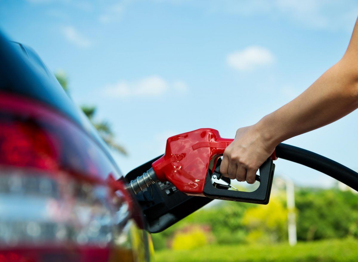 Hand Refilling The Car