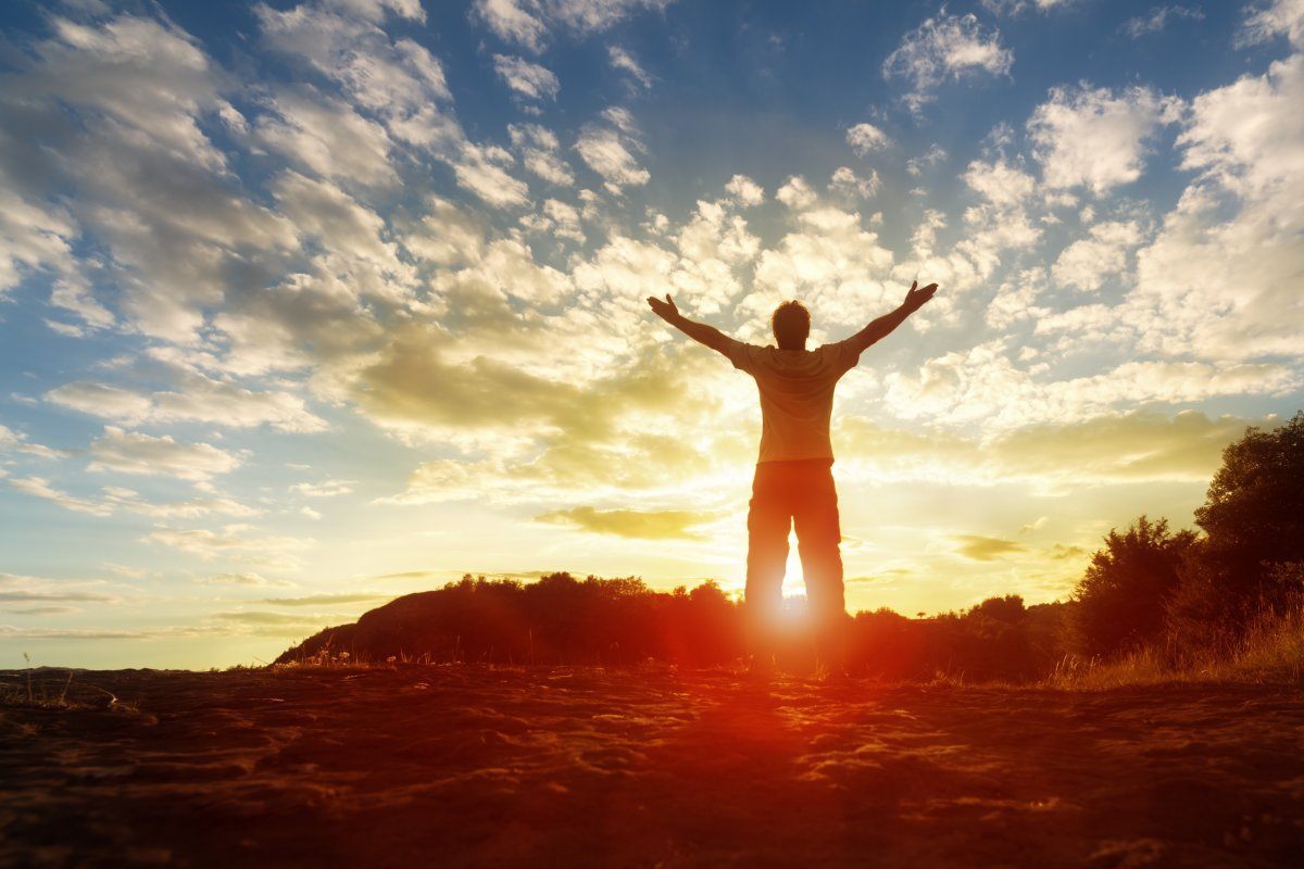 Silhouette Of A Man With Hands Raised for Religion