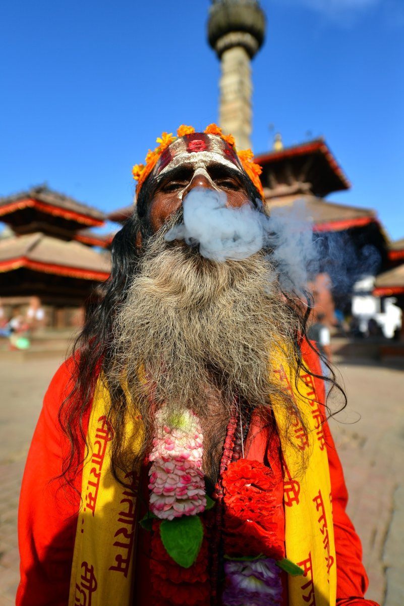 Kathmandu - Oct 10: Sadhu Man Smoking A Cigarette In The Durbar Square