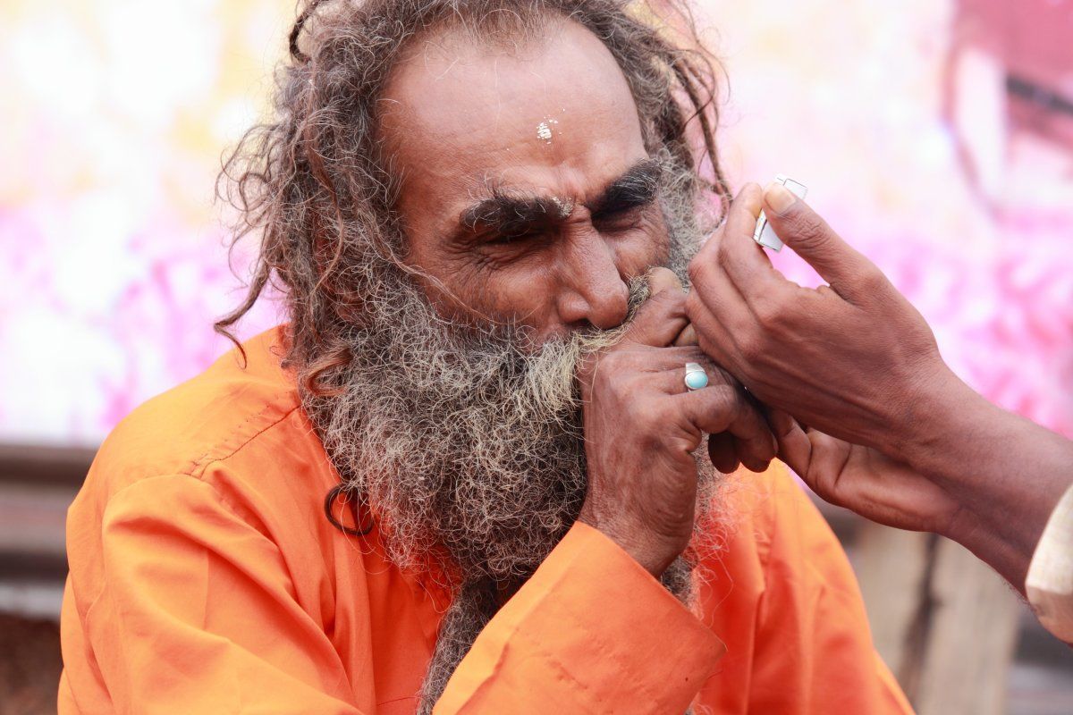 Smoke Chillum As He Participates In The Event Maha Kumbh Mela In Nashik, India.