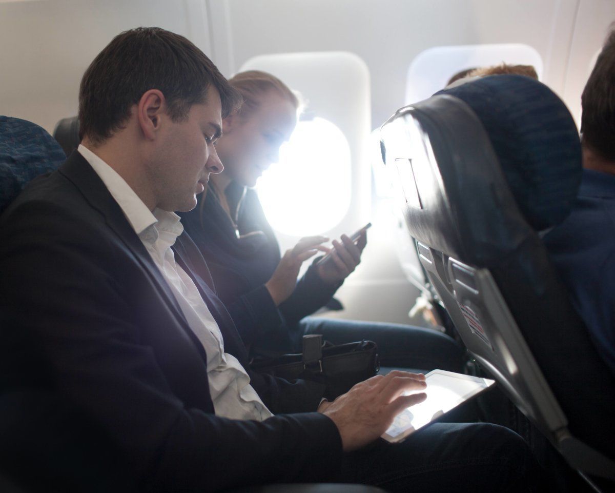 Tablet And Smart Phone on a Flight
