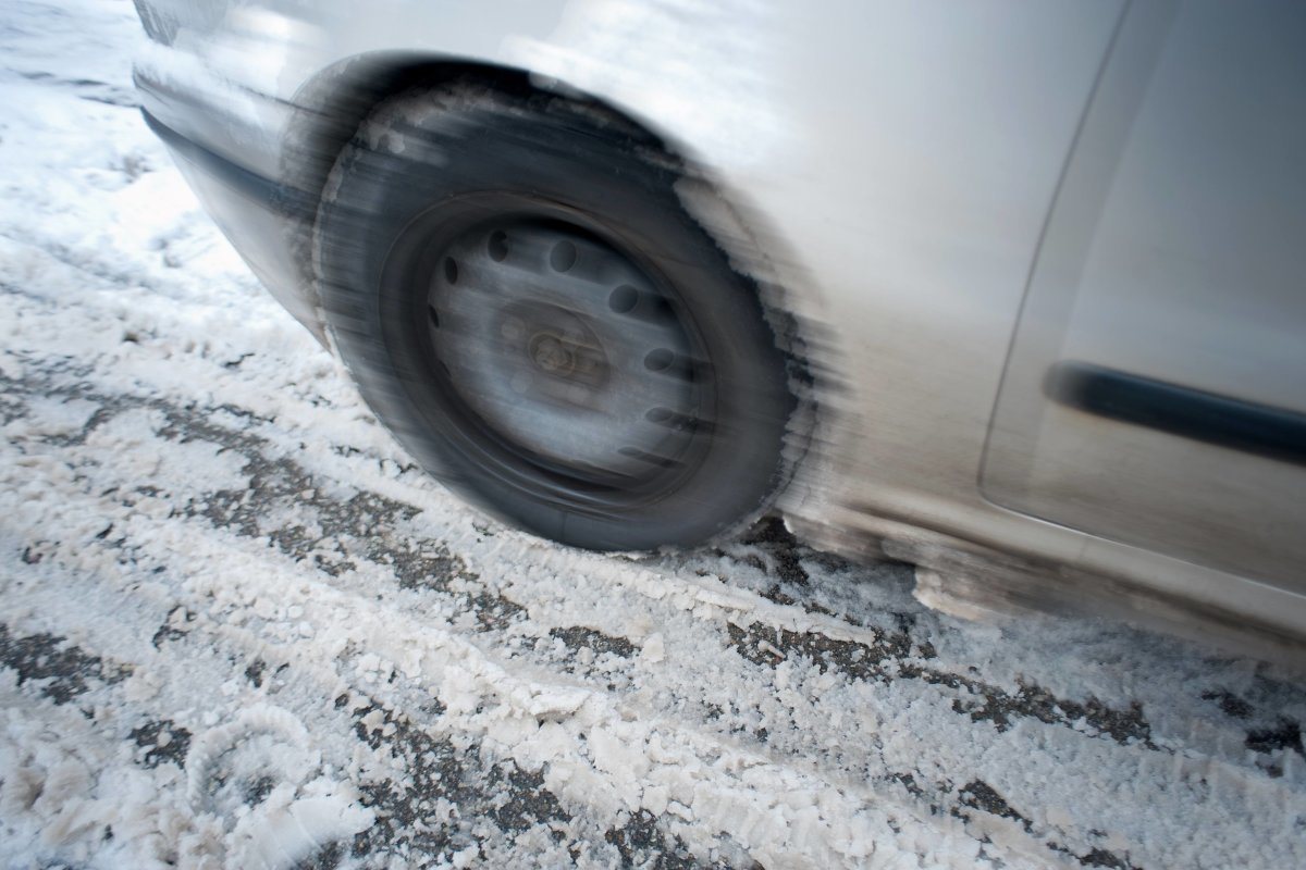 Tire Of A Sliding Car On Snow-Covered Street