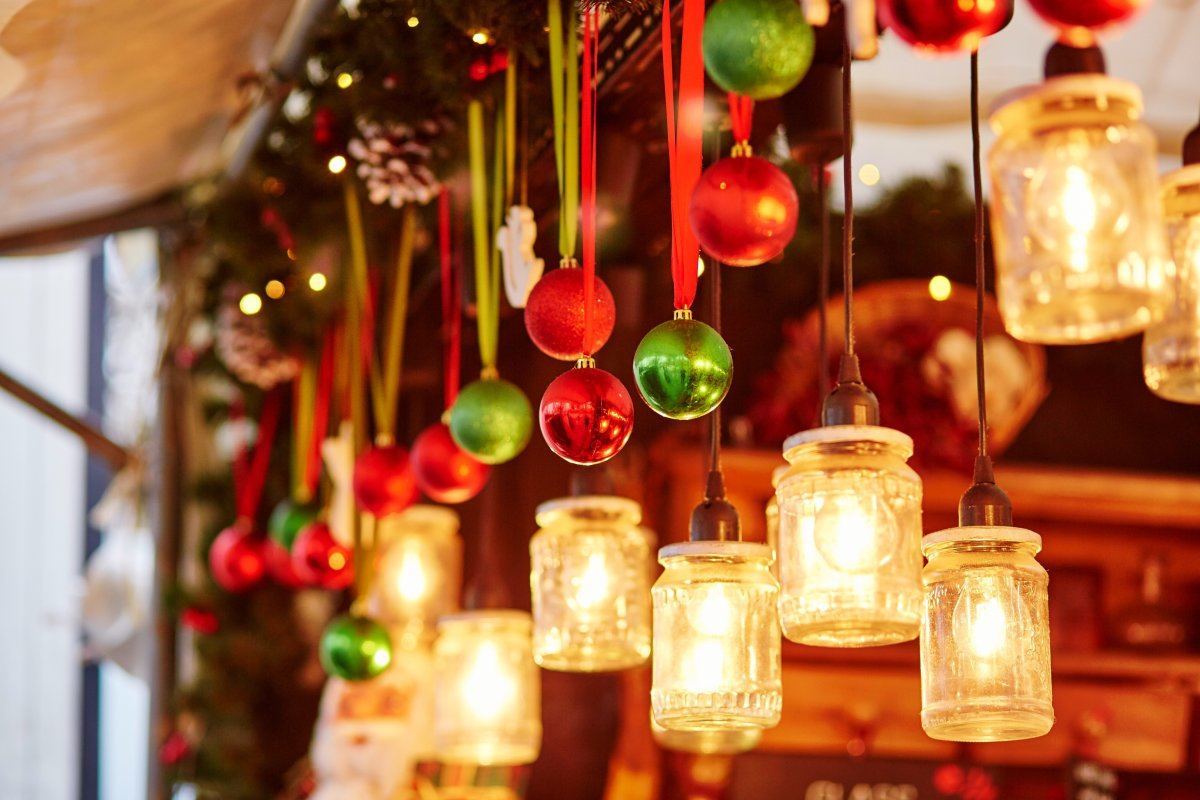 Colorful Christmas Decorations And Glass Lanterns On A Parisian Christmas Market