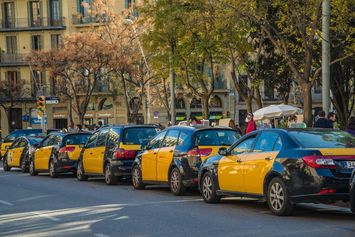Taxi Cars On The Street Of Barcelona Downtown.