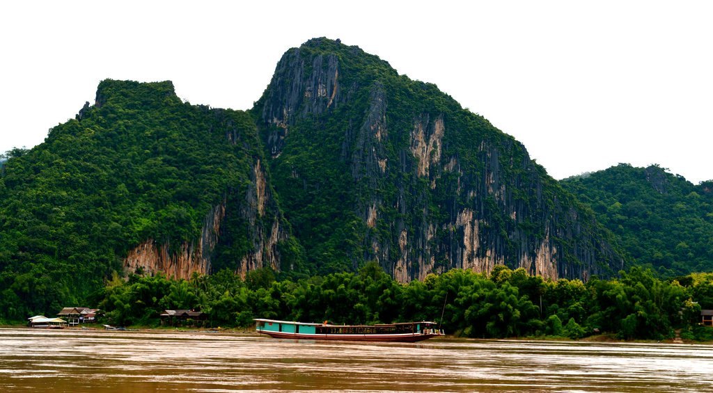 A traditional slow boat on the Mekong River in Laos