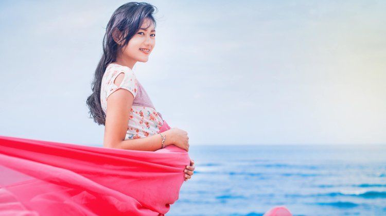 Beautiful Young Pregnant Asian Woman