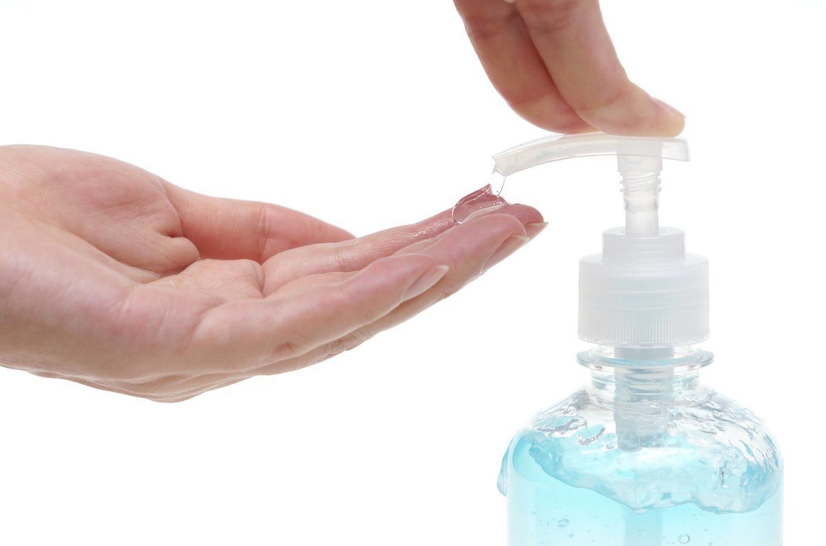 Hand Using Alcohol Gel