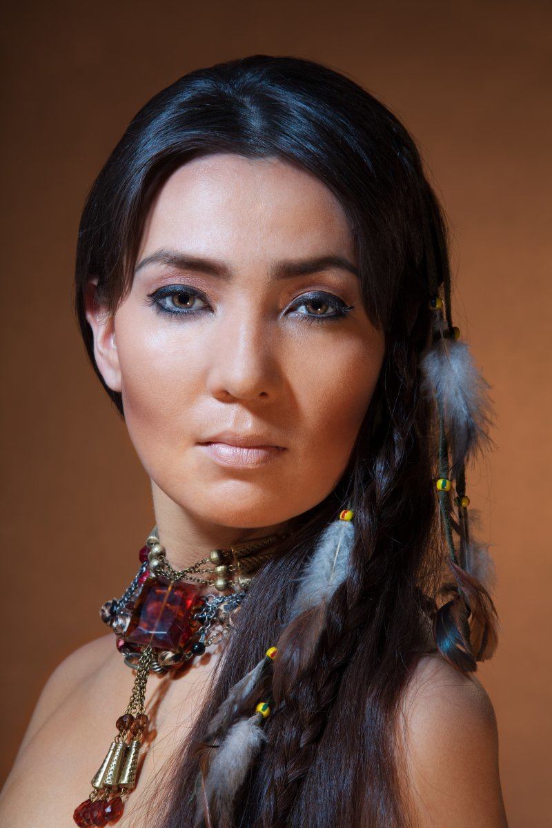 Studio Portrait Of American Indian Woman With Professional Makeup