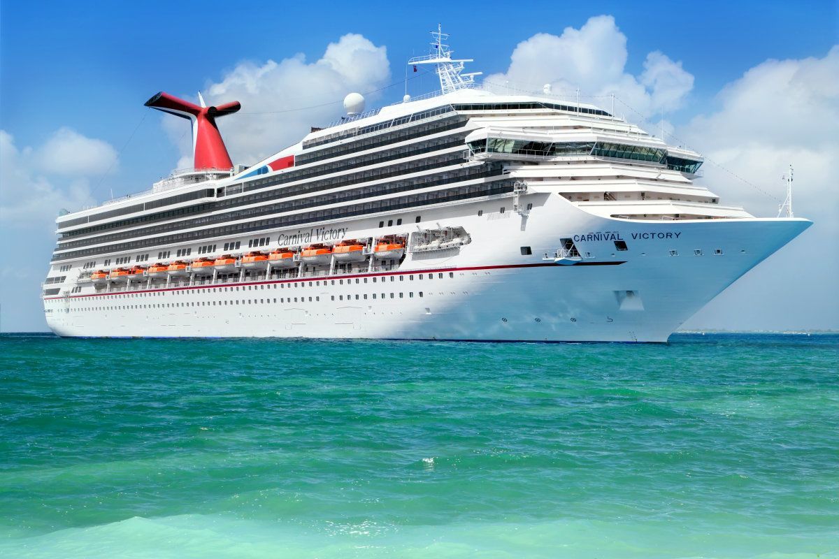 George Town, Grand Cayman Island - February 26: Carnival Cruise Line, Cruise Ship Carnival Victory Sails From Port George Town On February 26, 2013.