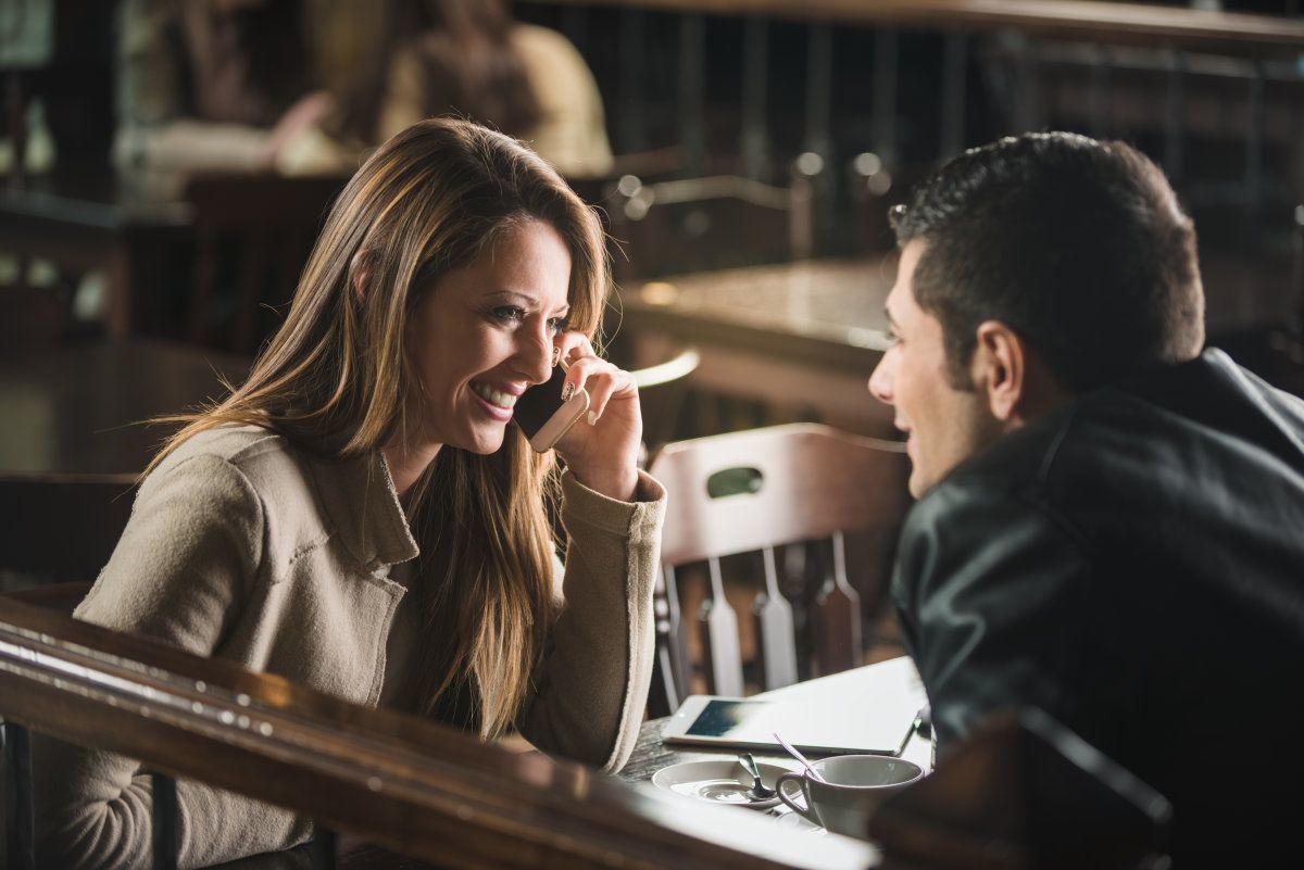 Man And Woman Dating At The Bar