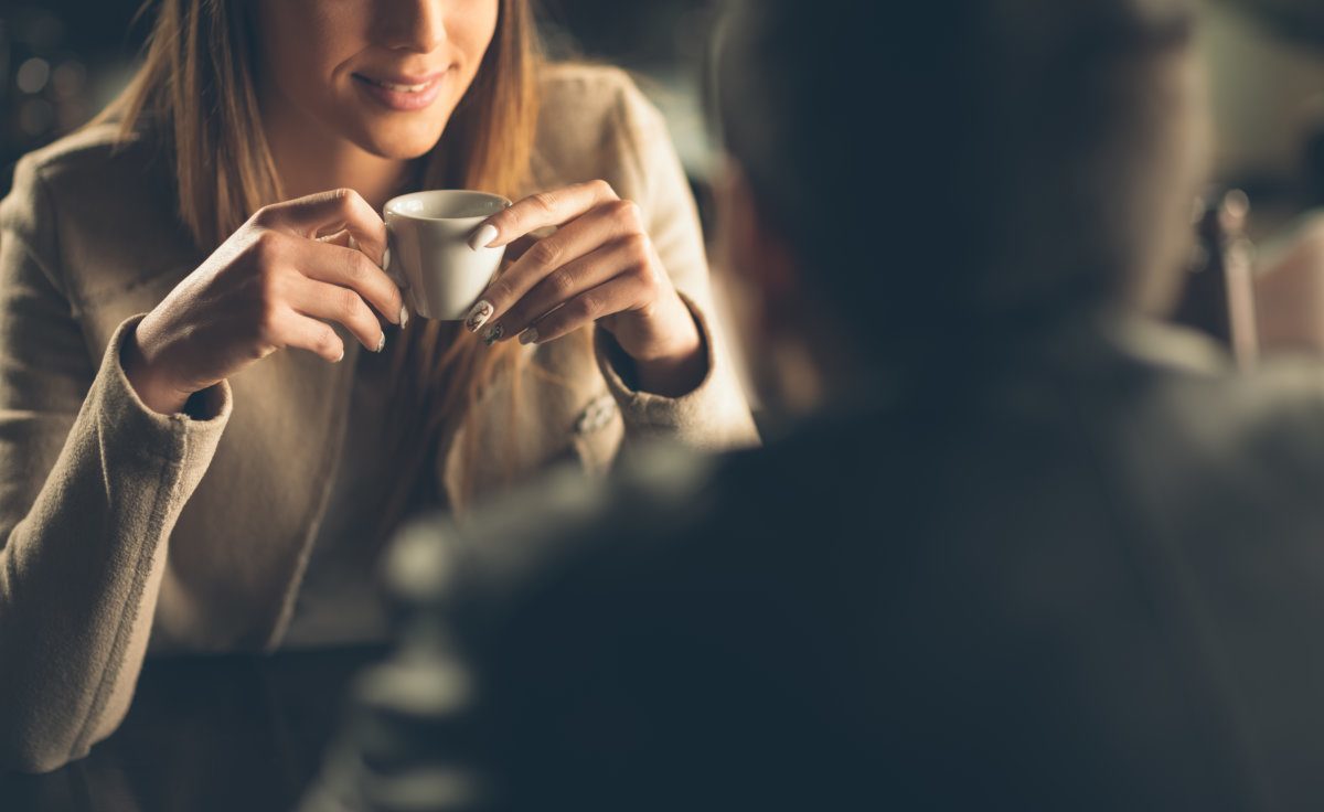 Young Fashionable Couple Dating Having A Coffee