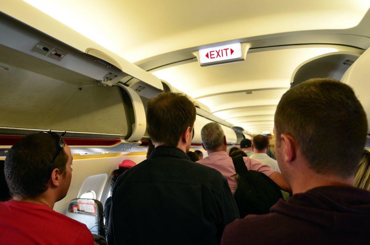 Airplane With Passengers Getting Off