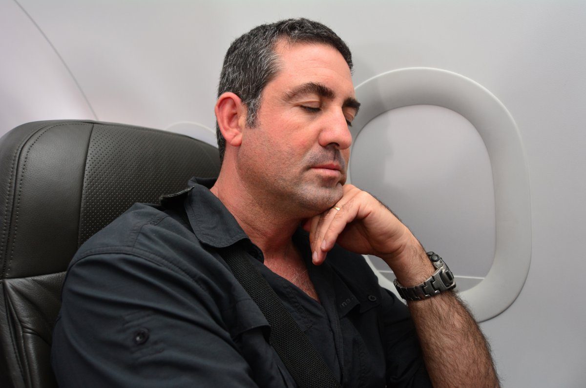 Man Sleep During Flight
