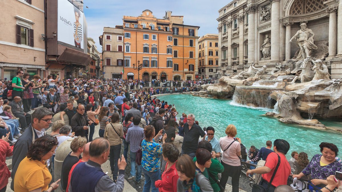 Trevi Fountain surrounded by tourists