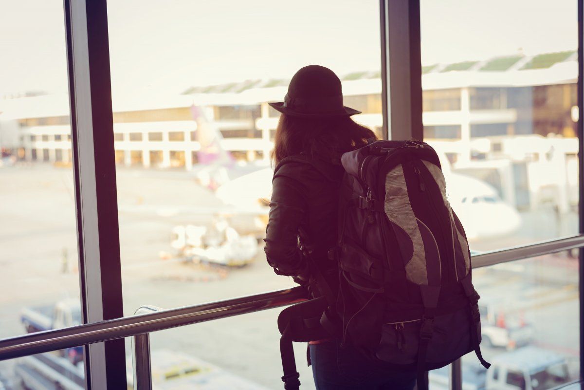 Waiting For Flight At Airport Terminal.