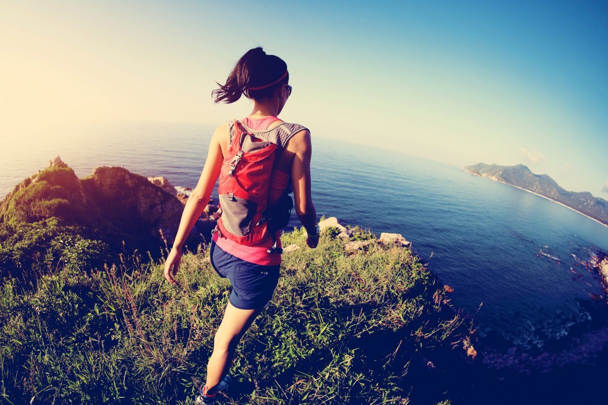 Young Runner On Sunrise Seaside Trail