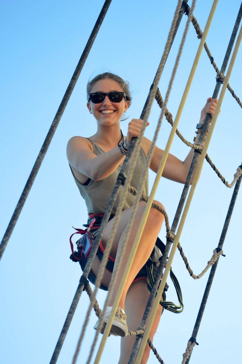 Climbing the shrouds up the foremast