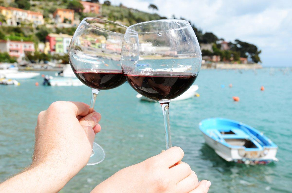 Two Wineglasses In The Hands in Italy