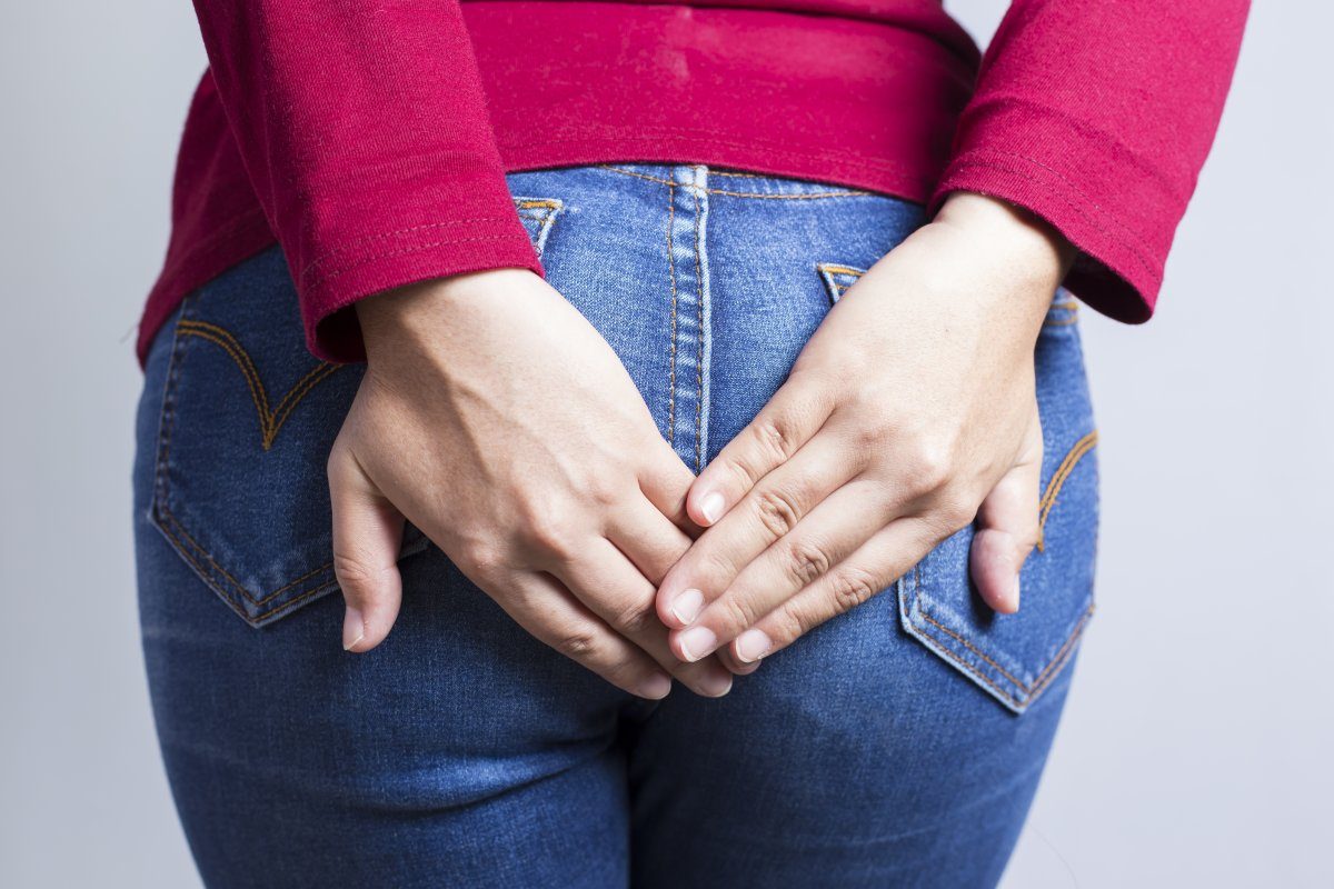 Woman Holding Her Butt fart