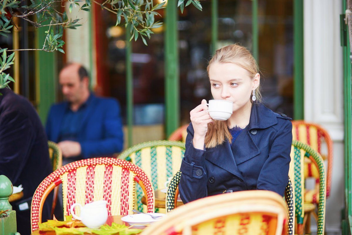 Woman in Parisian Outdoor Cafe