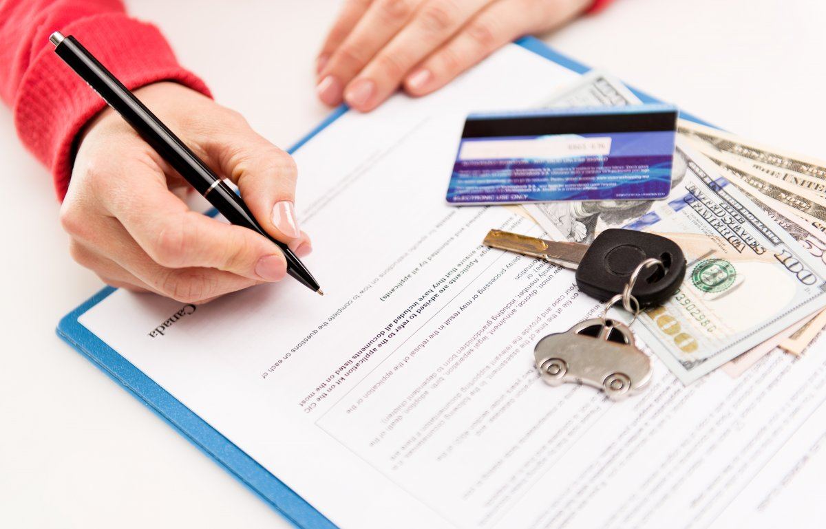 Young Female Renting Car