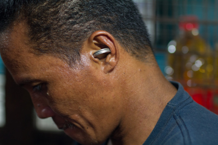 coin in ear