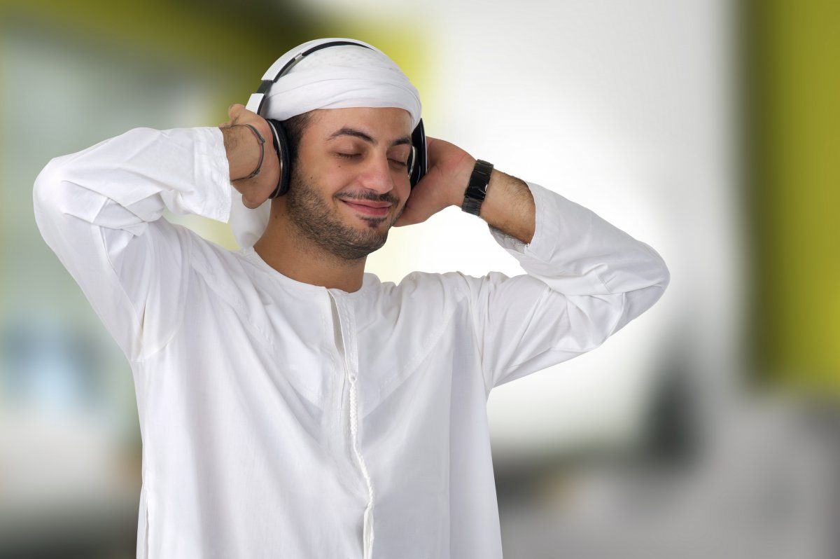 Arabian Man Listening To Music