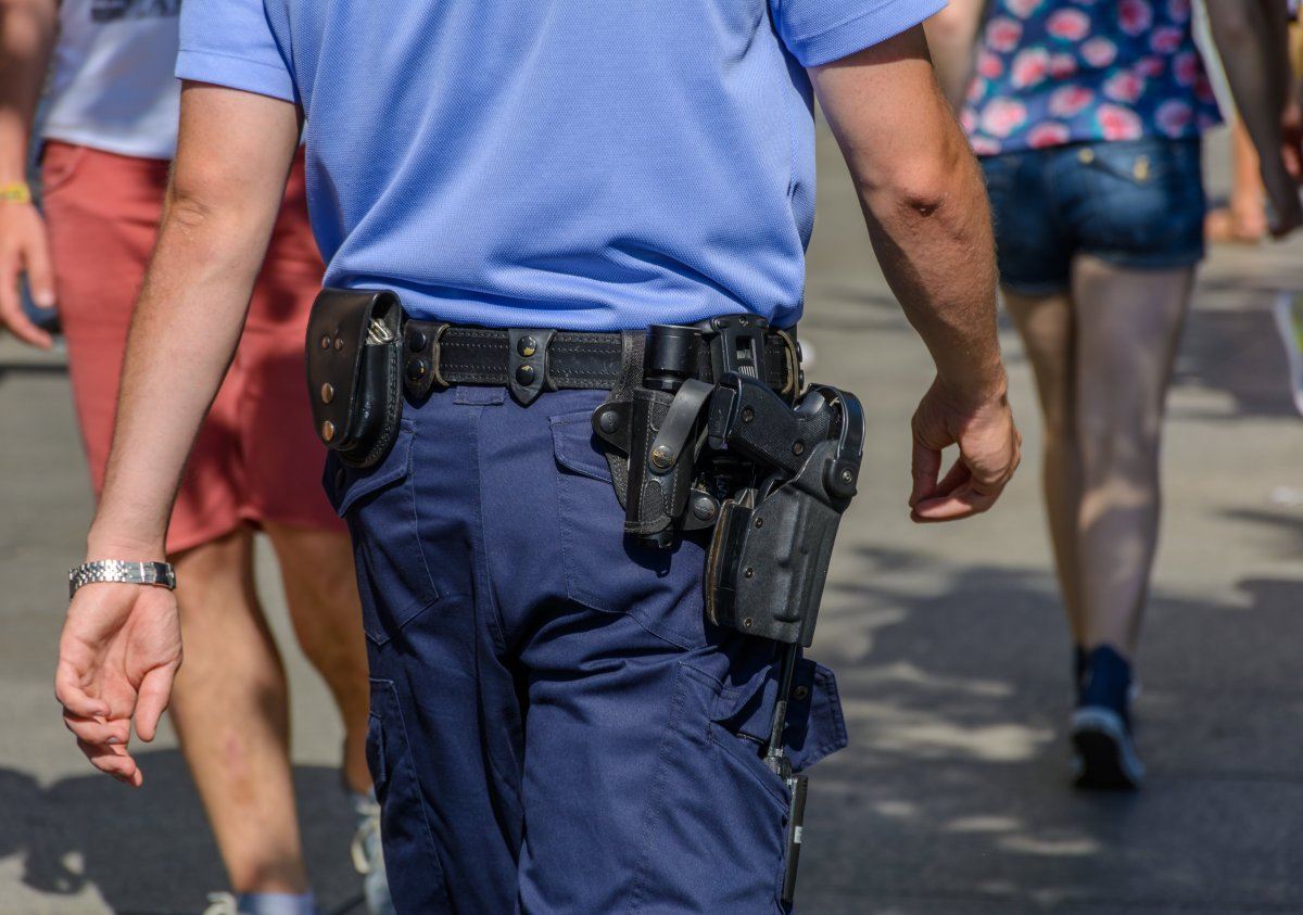 Close-Up German Police Officer with Gun