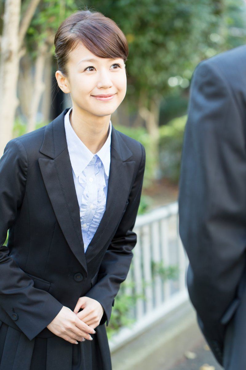 Smiling Asian Man And Woman