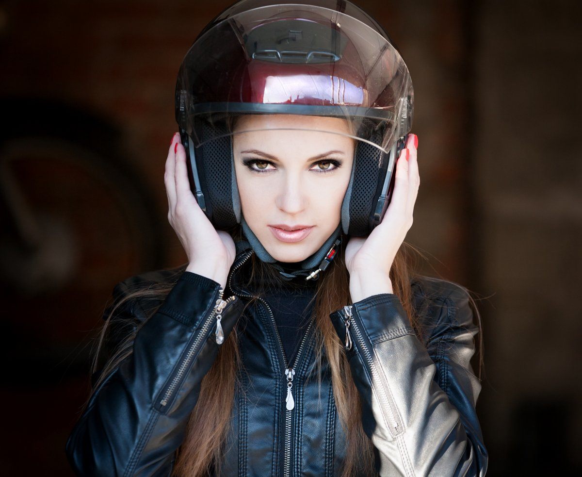 Woman in helmet.