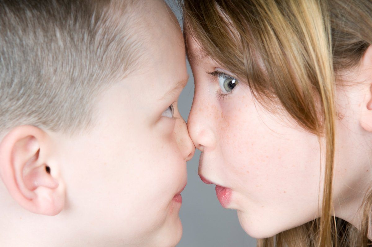 Young Boy And Girl Acting Silly