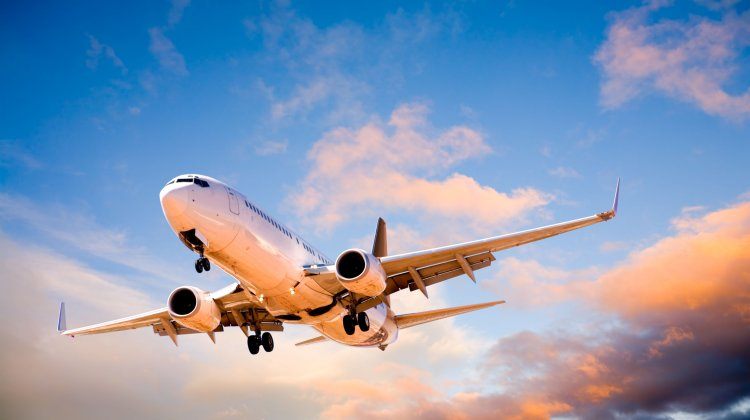 Place Flying In Sunset Sky.