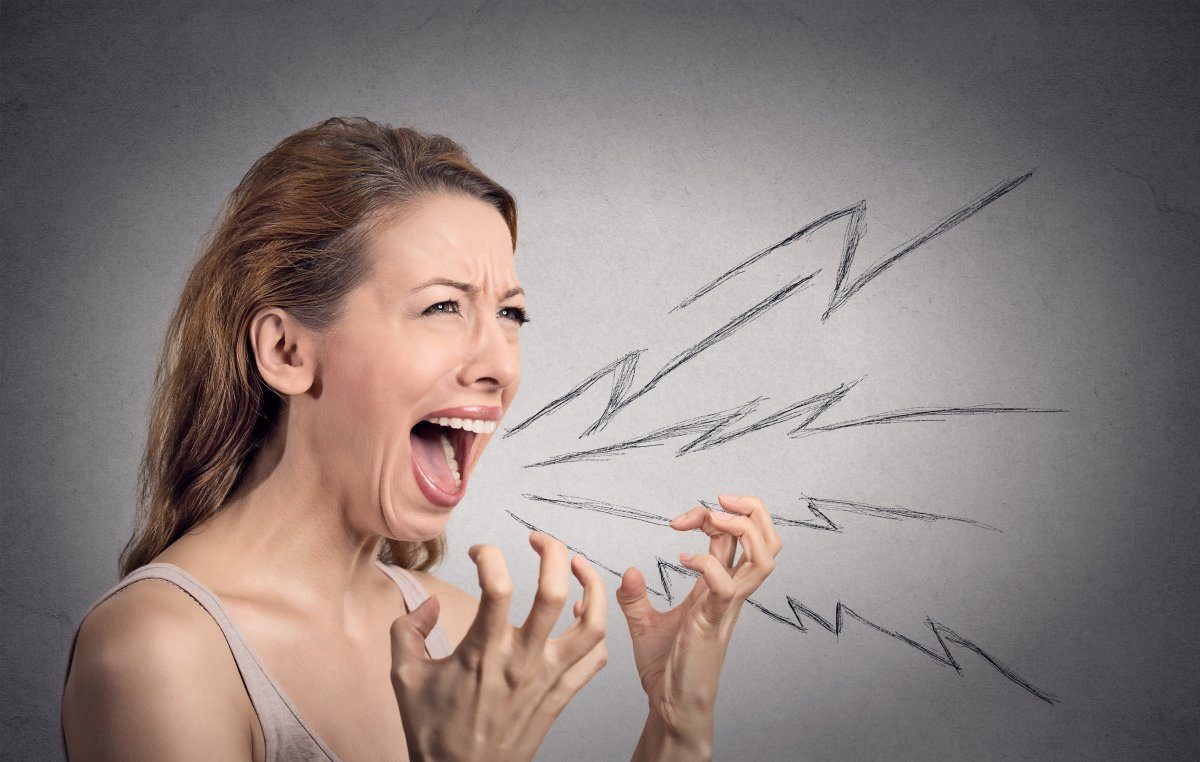 Side View Portrait Angry Woman Screaming, Wide Open Mouth, Hysterical Isolated Grey Wall Background. Negative Human Face Expressions, Emotion, Bad Feelings Reaction. Conflict, Confrontation Concept