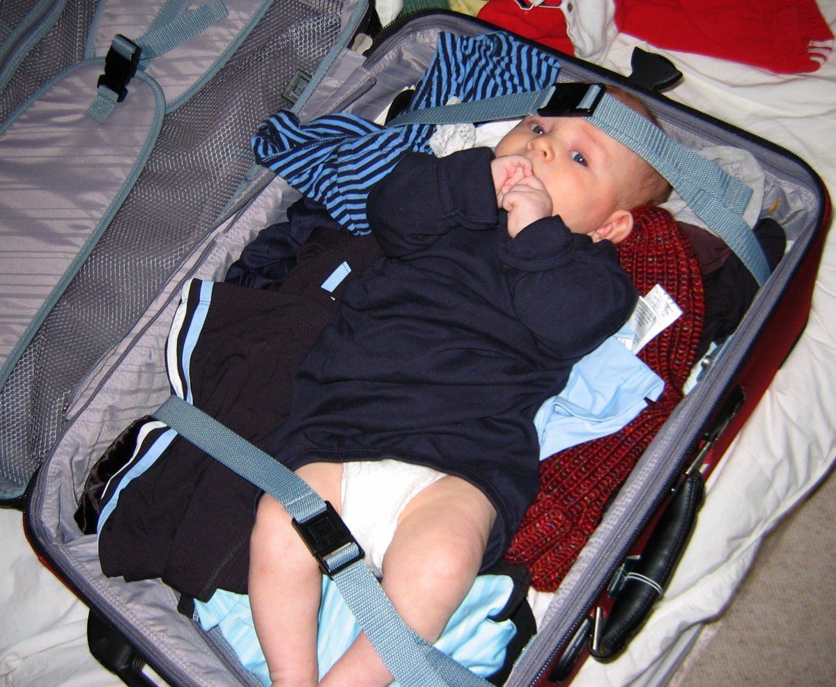 baby in suitcase