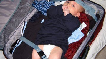 baby in suitcase