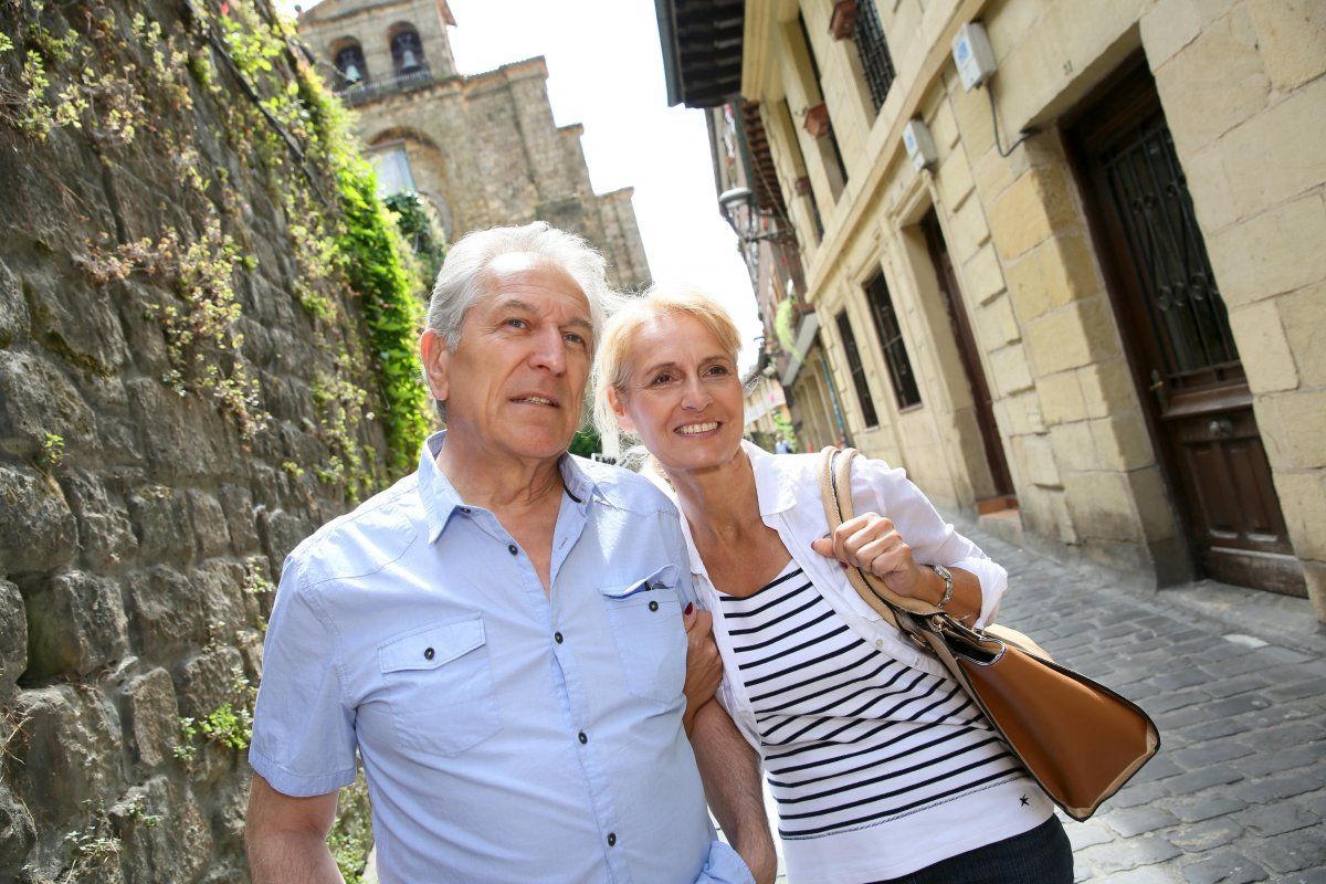 Senior Couple Visiting Northern Spanish Town