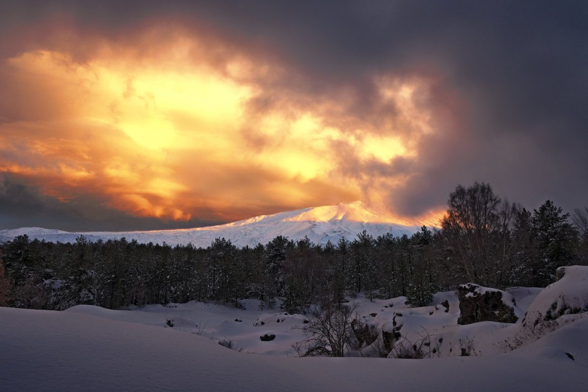 Dramatic Light Sky Sunset On Snow