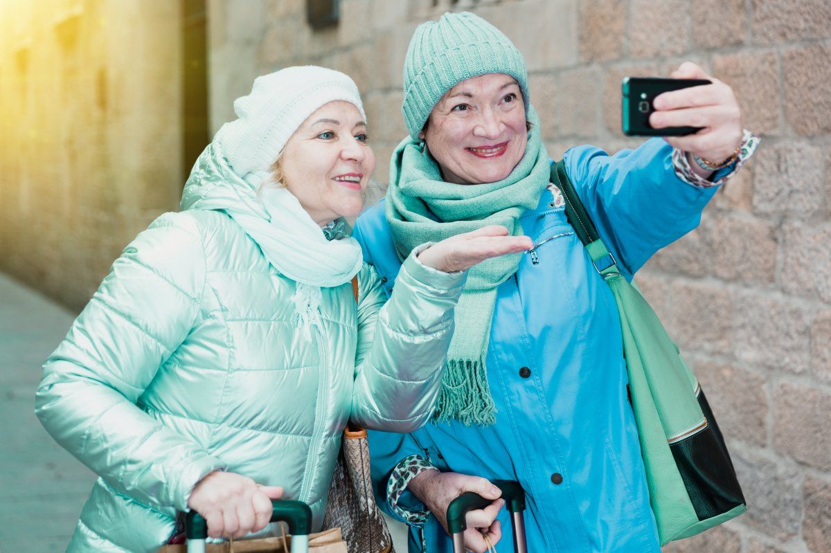 Happy Elderly Women Tourists Making Selfie