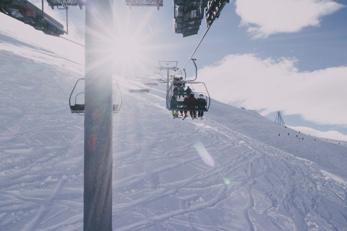 People On Ski Lift On Foggy