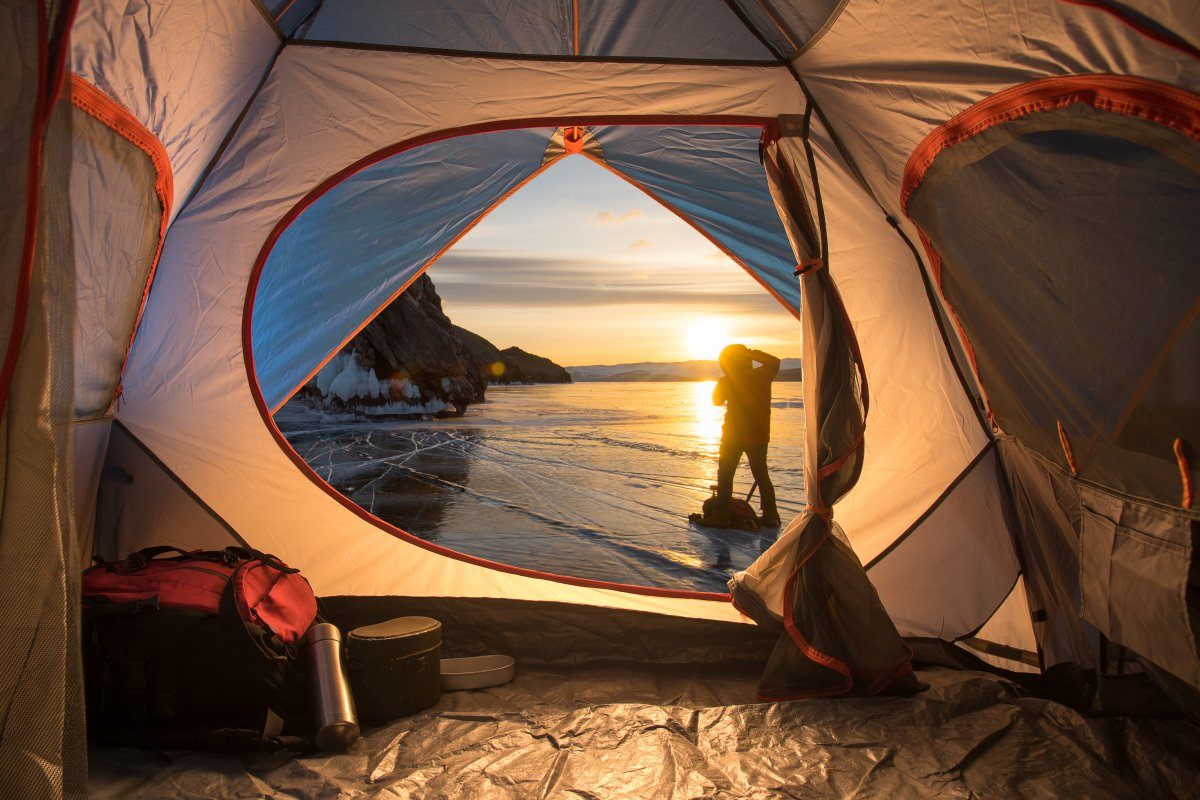Sunrise Inside Tent Camping Concept