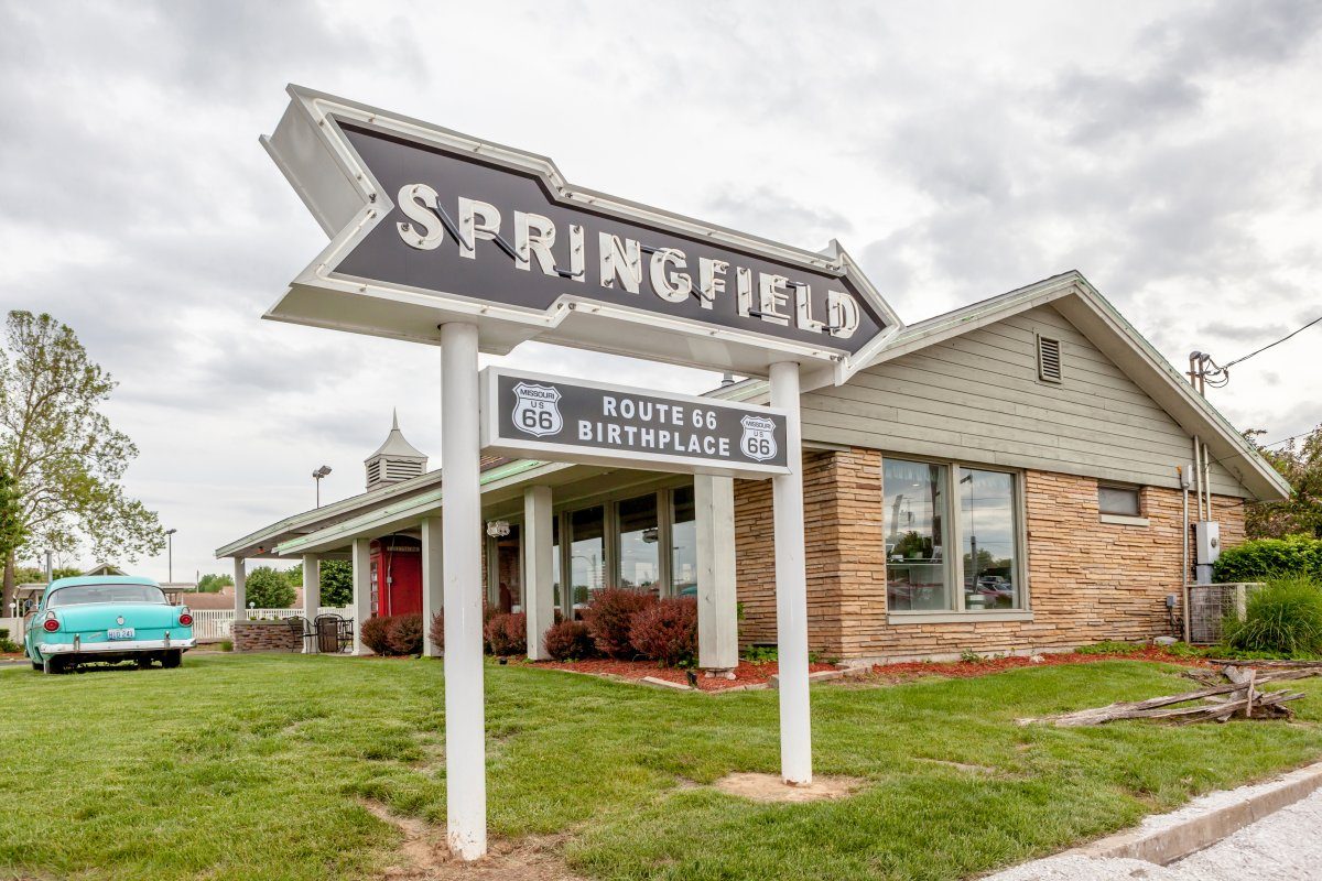 Springfield road arrow sign with cafe background in best western route 66 rail haven.